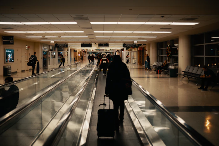 Traveler walking through an airport terminal